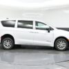 White Chrysler Voyager with BraunAbility Rear Entry Manual Fold Out conversion