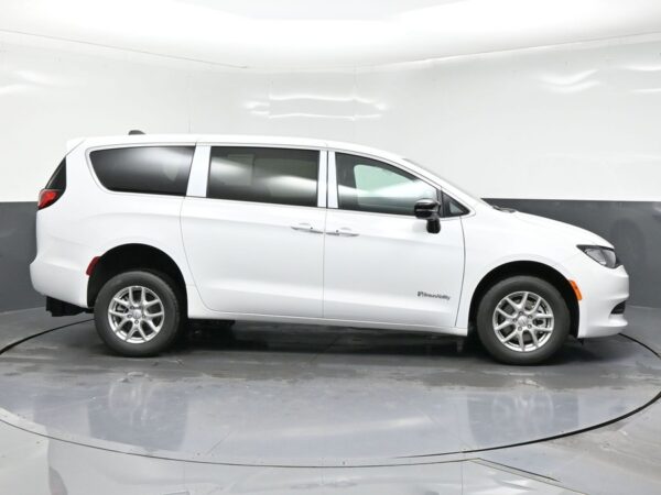 White Chrysler Voyager with BraunAbility Rear Entry Manual Fold Out conversion