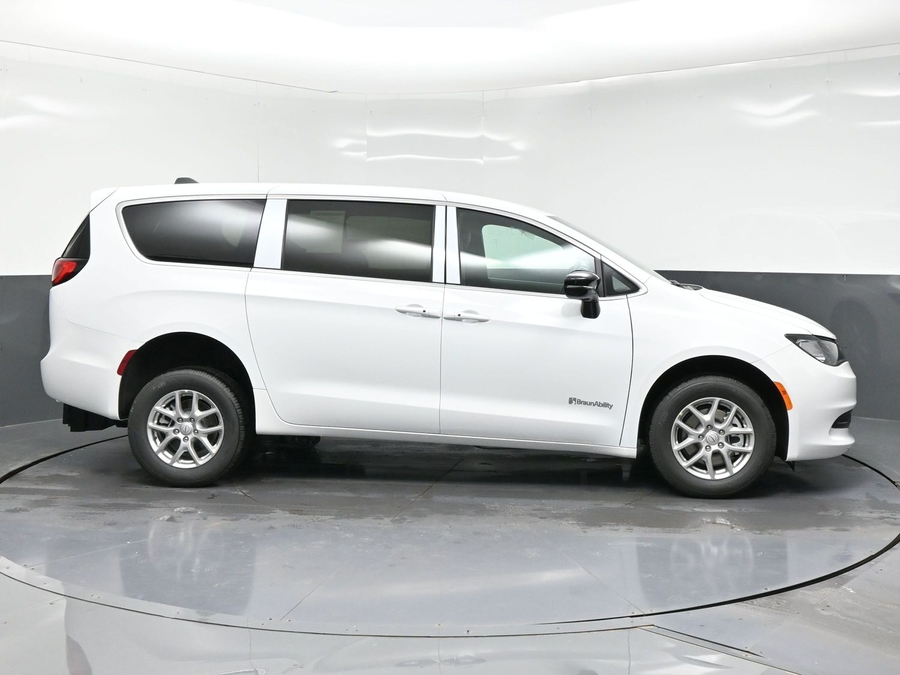 White Chrysler Voyager with BraunAbility Rear Entry Manual Fold Out conversion