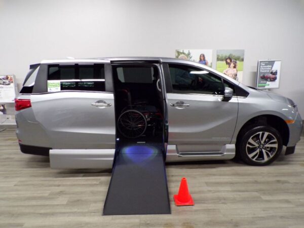 Silver Honda Odyssey with Vantage Mobility Side Entry Automatic In Floor conversion