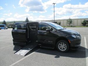 Black Chrysler Voyager with BraunAbility Side Entry Automatic Fold Out conversion