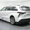 White Toyota Sienna with BraunAbility Side Entry Automatic Fold Out conversion