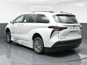 White Toyota Sienna with BraunAbility Side Entry Automatic Fold Out conversion
