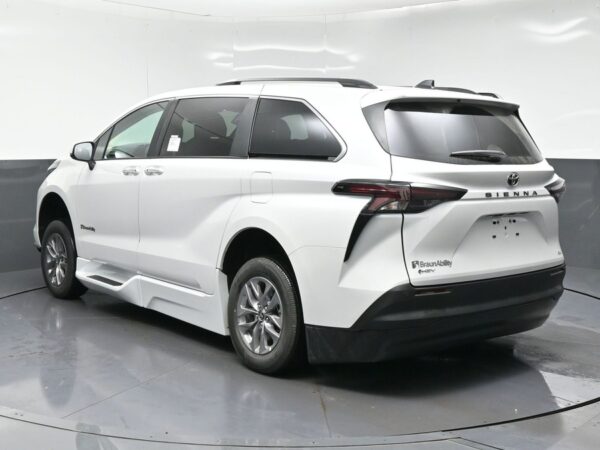 White Toyota Sienna with BraunAbility Side Entry Automatic Fold Out conversion