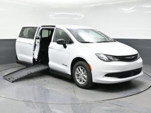 White Chrysler Voyager with BraunAbility Side Entry Manual Fold Out conversion