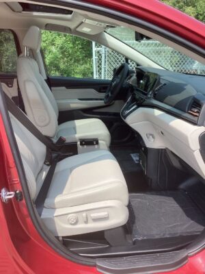 Red Honda Odyssey with BraunAbility Side Entry Automatic In Floor conversion