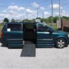 Green Dodge Grand Caravan with BraunAbility Side Entry Automatic Fold Out conversion