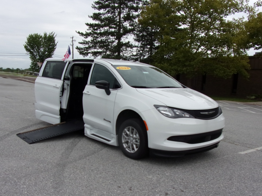 White Chrysler Voyager with BraunAbility Side Entry Automatic In Floor conversion