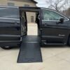 Black Chrysler Voyager with BraunAbility Side Entry Automatic Fold Out conversion