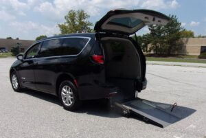 Black Chrysler Pacifica with Driverge Rear Entry Manual Fold Out conversion