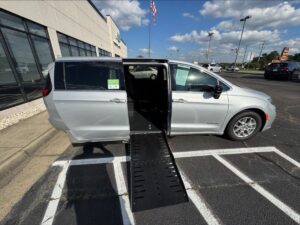 Silver Chrysler Pacifica with Driverge Side Entry Automatic Fold Out conversion