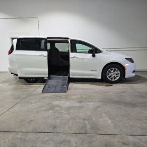 White Chrysler Voyager with Driverge Side Entry Automatic Fold Out conversion