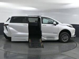 White Toyota Sienna with BraunAbility Side Entry Automatic Fold Out conversion