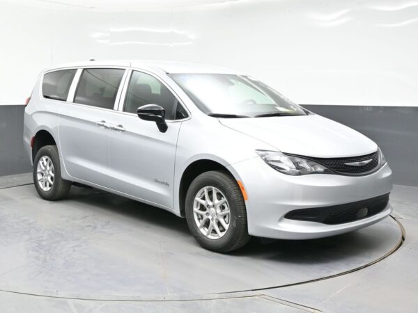 Silver Chrysler Voyager with BraunAbility Rear Entry Manual Fold Out conversion