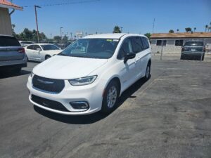 White Chrysler Pacifica with Driverge Rear Entry Manual Fold Out conversion