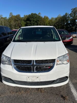 White Dodge Grand Caravan with BraunAbility Side Entry Manual Fold Out conversion