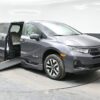 Grey Honda Odyssey with BraunAbility Side Entry Automatic In Floor conversion