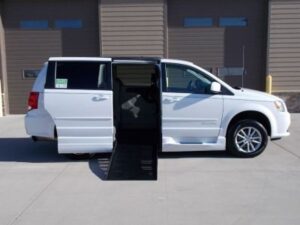 White Dodge Grand Caravan with BraunAbility Side Entry Automatic Fold Out conversion