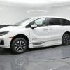 White Honda Odyssey with BraunAbility Side Entry Automatic In Floor conversion