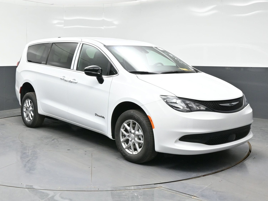 White Chrysler Voyager with BraunAbility Rear Entry Manual Fold Out conversion