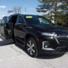 Black Chevrolet Traverse with BraunAbility Side Entry Automatic In Floor conversion