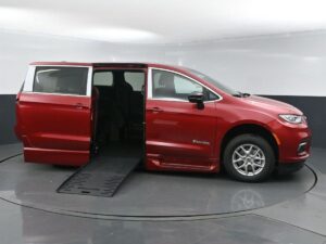 Red Chrysler Pacifica with BraunAbility Side Entry Automatic Fold Out conversion