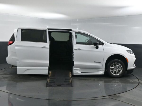 White Chrysler Pacifica with BraunAbility Side Entry Automatic Fold Out conversion