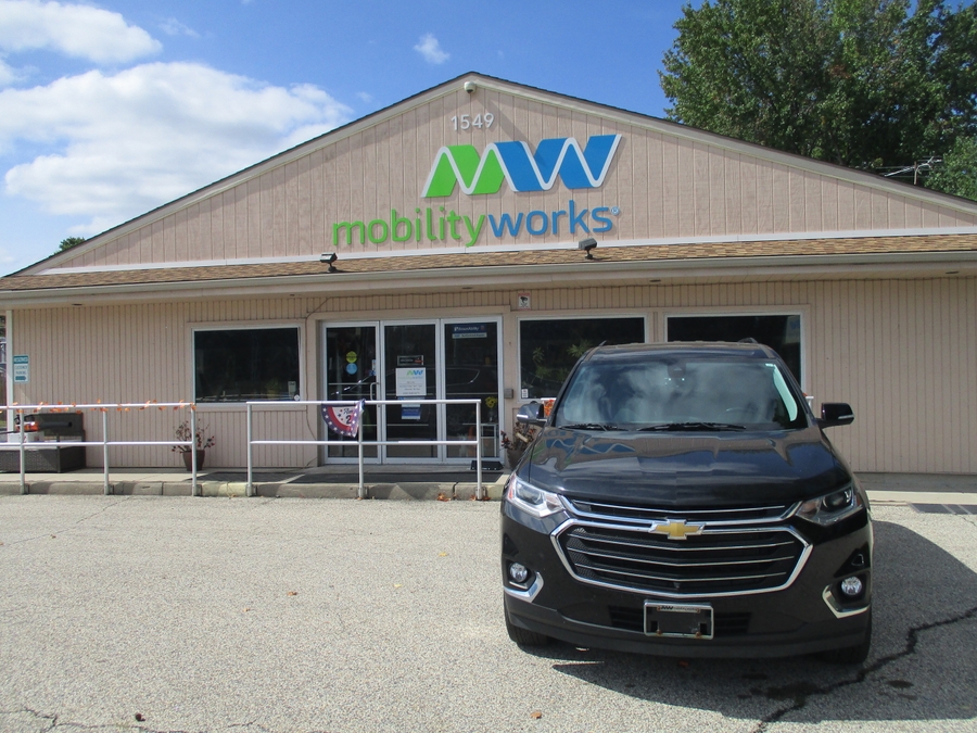 Black Chevrolet Traverse with BraunAbility Side Entry Automatic In Floor conversion