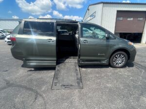 Green Toyota Sienna with BraunAbility Side Entry Automatic In Floor conversion