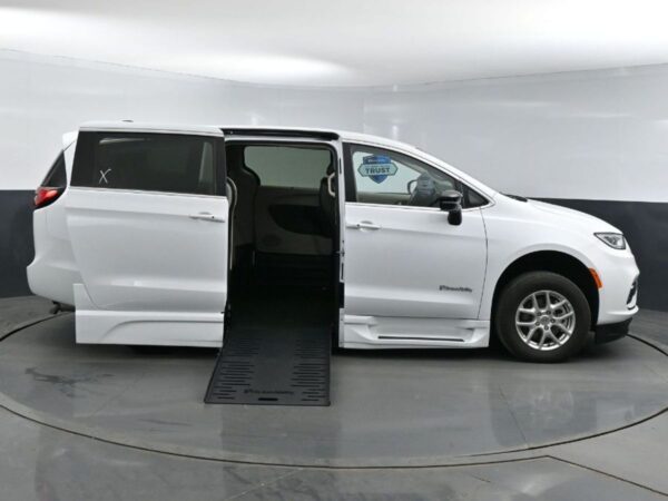 White Chrysler Pacifica with BraunAbility Side Entry Automatic Fold Out conversion