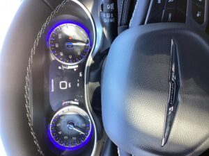 Blue Chrysler Pacifica with Driverge Side Entry Automatic Fold Out conversion