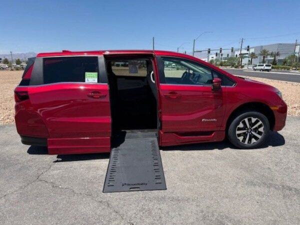 Red Honda Odyssey with BraunAbility Side Entry Automatic In Floor conversion