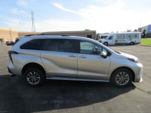 Silver Toyota Sienna with Driverge Rear Entry Manual Fold Out conversion