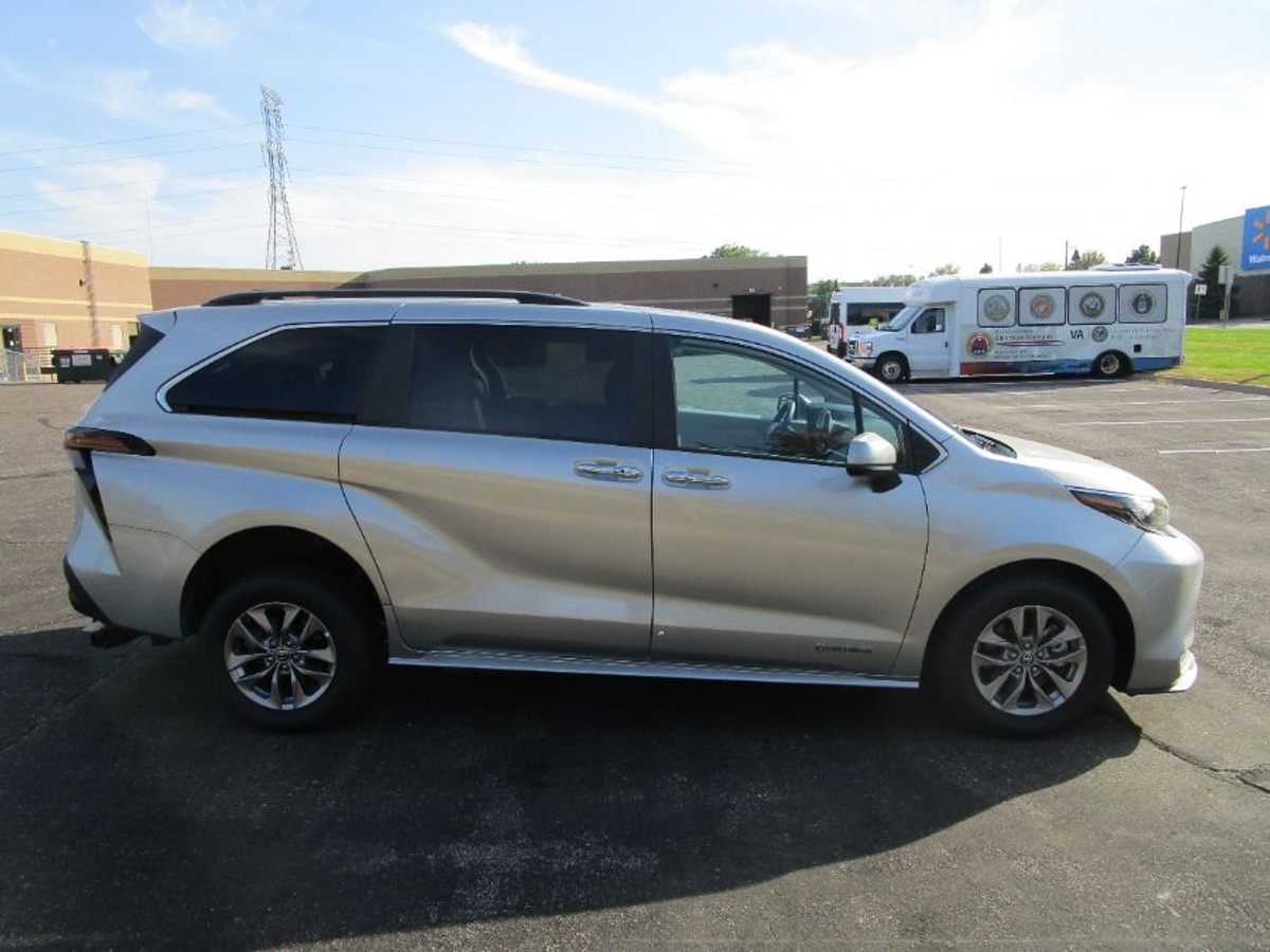 Silver Toyota Sienna with Driverge Rear Entry Manual Fold Out conversion
