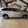 Silver Toyota Sienna with Driverge Rear Entry Manual Fold Out conversion