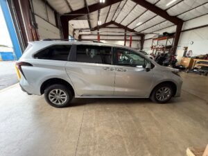 Silver Toyota Sienna with Driverge Rear Entry Manual Fold Out conversion