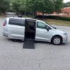 Silver Chrysler Pacifica with Driverge Side Entry Automatic Fold Out conversion