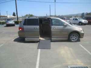Gold Honda Odyssey with Vantage Mobility Side Entry Automatic In Floor conversion