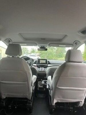 Silver Honda Odyssey with BraunAbility Side Entry Automatic In Floor conversion