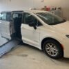 White Chrysler Voyager with Driverge Side Entry Automatic Fold Out conversion