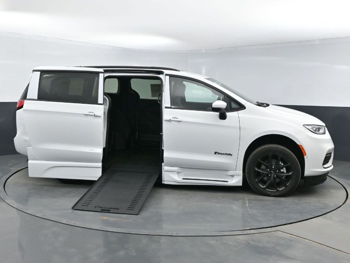 White Chrysler Pacifica with BraunAbility Side Entry Automatic In Floor conversion
