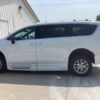 White Chrysler Voyager with BraunAbility Side Entry Automatic Fold Out conversion