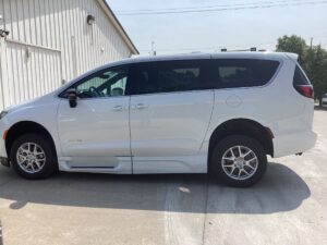 White Chrysler Voyager with BraunAbility Side Entry Automatic Fold Out conversion