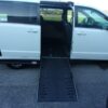 White Dodge Grand Caravan with Adaptive Vans Side Entry Automatic Fold Out conversion