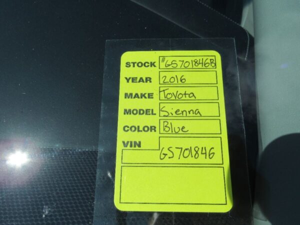 Silver Toyota Sienna with BraunAbility Side Entry Automatic In Floor conversion