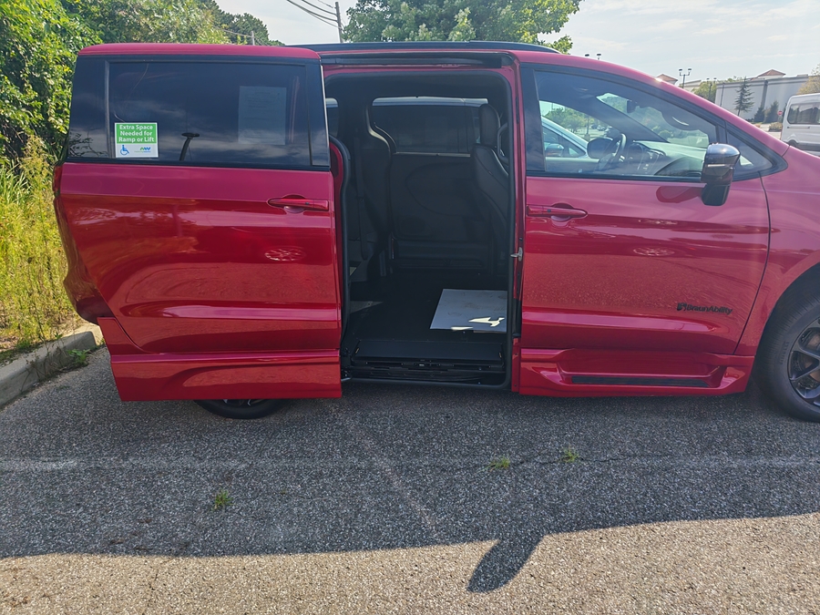 Red Chrysler Pacifica with BraunAbility Side Entry Automatic In Floor conversion