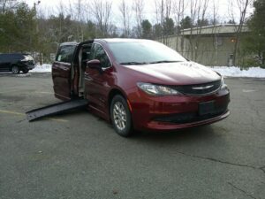 Red Chrysler Voyager with BraunAbility Side Entry Automatic Fold Out conversion