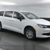 White Chrysler Voyager with BraunAbility Rear Entry Manual Fold Out conversion