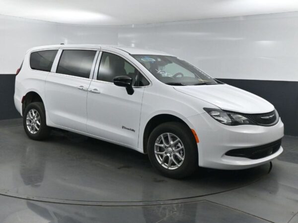 White Chrysler Voyager with BraunAbility Rear Entry Manual Fold Out conversion