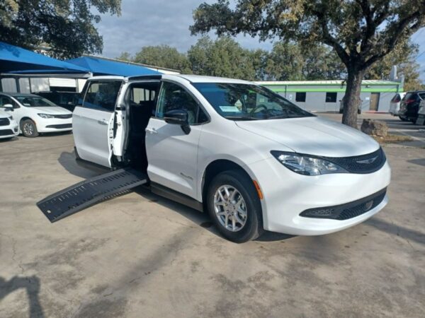 White Chrysler Voyager with BraunAbility Side Entry Manual Fold Out conversion
